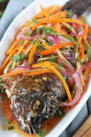 Make This Colorful Tangy Sweet Filipino Escabeche Or Sweet And Sour Fish And Bring Your Plain Fried Fish Fish Recipe Filipino Seafood Recipes Escabeche Recipe