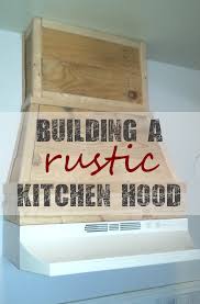 Building A Frame For The Rustic Pallet Kitchen Hood Kitchen Hoods Pallet Kitchen Diy Kitchen Cabinets
