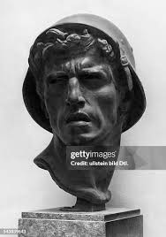 Bronze ' After the Battle ' by Hans Buehler shows the head of a young...  News Photo