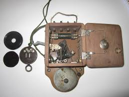 Somewhere in your house is a small transformer that is getting 120vac (primary) and based on what i understand (the outside wire) it's one wire getting interrupted & when pressing the door bell it creates contact resulting in the inside. Wiring A 1920s Intercom To A Contemporary Door Entry Phone Electrical Engineering Stack Exchange