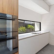 You can find all of these accessories in all of our lines of stock cabinetry! China Bespoke European Style Modern Kitchen Cabinets Off White Handless Kitchen China Kitchen Cabinets Kitchen Products