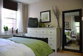 Use curtain panels or drapes to soften the sharp lines of a modern white bedroom while allowing in natural light. I Love The Mix Of Dark And White Furniture Guest Room Decor Home Decor White Bedroom Furniture