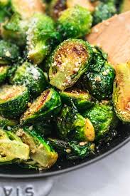 Sauteed Brussels Sprouts Recipe Easy Side Dish With Parmesan And Garlic In 2020 Sauteed Brussels Sprouts Recipe Brussel Sprouts Recipes Easy Brussels Sprouts Recipe