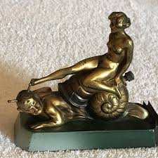 Find many great new & used options and get the best deals for katzhutte hertwig vintage art deco 1930s lady dancer figurine figure 912 model at the best online prices at ebay! A Rare Art Deco Gilt Metal Table Lighter Probably By Lorenzl Bronzes Hemswell Antique Centres