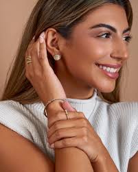 Add a touch of elegance to your look with these stunning pieces from  @davidyurman.✨ The Petite Helena Wrap Band Ring in sterling silver with 18K  yellow gold and diamonds is the perfect