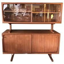 Stage this stunning wood veneer unit as a kitchen buffet, office credenza, or living room sideboard. Sold Price Mid Century Modern Sideboard Cabinet With Hutch Mid 20th Century Invalid Date Pdt