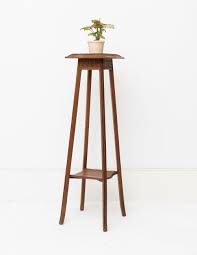 Tall Wooden Plant Stand With Carved Detail Sunday Shop Wooden Plant Stands Plant Stand Tall Stools