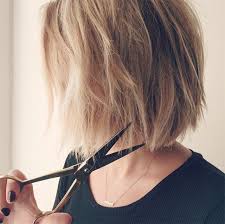 Keep your bangs long, but have your stylist. 15 Styling Tricks For Growing Out Short Hair