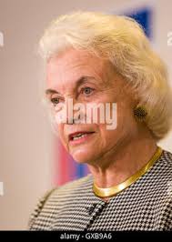 Supreme Court Justice Sandra Day O'Connor (L) exits the field following the  coin toss prior to the 92nd Rose Bowl Game in Pasadena, California