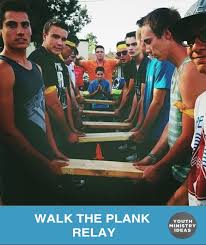 A relay race is a racing competition where members of a team take turns completing parts of racecourse or performing a certain action. Walk The Plank Great Relay Race Or Team Building Exercise Youth Ministry Ideas And Games Team Building Games Youth Group Games Youth Games