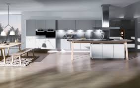 We like the layout of the new room but the new dining table will be just a few feet from the existing kitchen table. Next125 Cooking Table