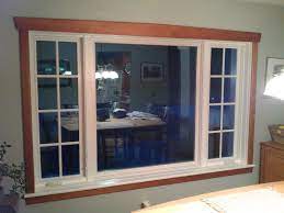 Vinyl windows offer many choices as far as design and style. Don T Like Trim But White Window Natural Wood Trim White Window Trim Oak Trim Wood Window Trim