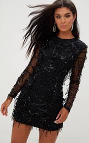 Long sleeves aren't just for fall and winter: Black Sequin Detail Long Sleeve Mini Dress Prettylittlething