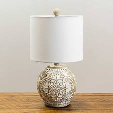 Unique bedside table lamps made from glass, crystal, plastic, wood, concrete, metal & more. Carved Floral Table Lamp Kirklands