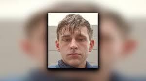 Man charged after kicking in door, causing seizure