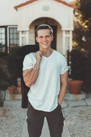 Best Male Poses For Portrait Photos Posing Tips For Men Confident boy standing with backpack standing after classes before sports and looking at camera. best male poses for portrait photos