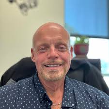 When is the phrase 'macho head games' uttered in Seinfeld?