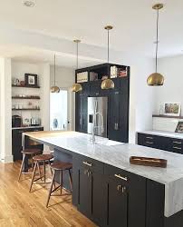The modern cabinets are completely different in looks, and you may feel like they're a little smaller from the outside, but that is just how they are made. How Can Black Kitchen Cabinets Make A Small Kitchen Look Good The Architects Diary