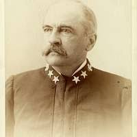 Lou Barrett, middle, and Rear Adm. Mark Hugel of Naval