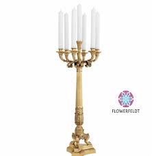 Decorative candle holders are excellent for enhancing the ambiance of any dining room. Candle Holder Gold Jefferson Eichholtz Golden Candle Holder Flowerfeldt