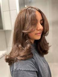 Looking for layered haircut model in Newtown