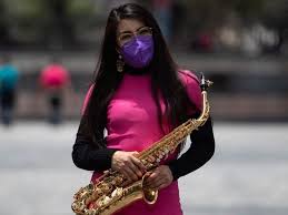 Mexican saxophonist endures near fatal acid attack, returns to the stage