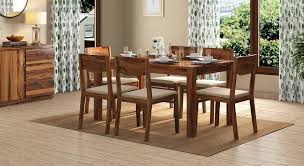 The urban electric company celebrates 15 years as a design leader in the custom lighting industry. Arabia 6 Seater Dining Table Urban Ladder