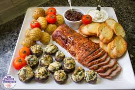 A pork tenderloin should cook for 30 to 35 minutes a rolled pork loin should cook for 20 to 30 minutes per pound, or until reaching the. Sheet Pan Savory Brown Sugar Pork Tenderloin With Hasselback Potatoes And Stuffed Mushrooms