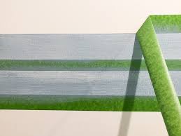 How to paint a striped wall. Washed Out Stripes Bathroom Accent Wall