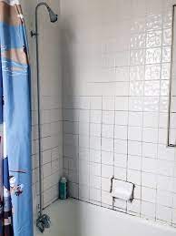 The Best Thing We Did To This Rental Bathroom Was Almost Free Shower Tile Rental Bathroom Grout Cleaner