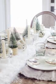 Love The White Faux Fur Runner And Bottlebush Trees On This Holiday Table Christmas Dining Table Christmas Dining Table Decor Christmas Dining Room