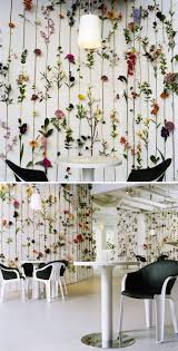 An Installation Of Silk And Plastic Flowers Simply Mounted On Walls By Swedish Design Group Front Zimmerdecken Dekorieren Plastikblumen