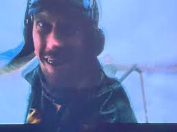 Watching Mad Max: The Road Warrior. (1982) I was 9 y/o then. Maybe I saw it  a couple of years later at an older cinema or tv airing. People say now that