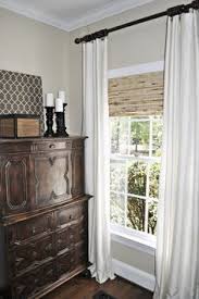 Neutral Curtain Panels Hung High For 10 Foot Ceilings Home Interior Bamboo Blinds