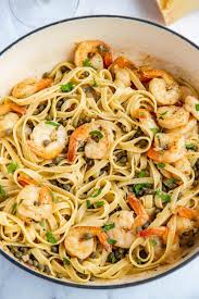 This Buttery Garlic Shrimp Scampi Made With Capers A Dash Of White Wine And Lemon Is Loaded With Flavor An Easy Pasta Recipes Lemon Garlic Pasta Shrimp Scampi