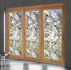A simple pair of sheer panels or opaque curtains will filter light while still providing privacy. Tropical Leaves Sliding Glass Door Static Cling Window Film World