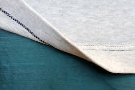 Overcome your knit fabric anxiety and see how easy it can be to stitch with stretch with this helpful guide to sewing knits with or without a serger! How To Hem Knit Fabric Five Different Ways Craftsy