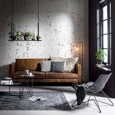 Modern Scandinavian Industrial Living Room With A Brown Velvet Couch And With Grey Details Industrial Living Room Design Living Decor House Interior