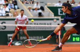 Serbia's novak djokovic plays a return to italy's lorenzo musetti during their fourth round match on day 9, of the french open tennis tournament at roland garros in paris, france, monday, june 7. Yv Xil Elr6orm