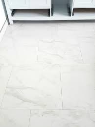 Polyurethane and similar sealants help make kitchen cork tiles as impervious as a natural flooring material can get. Choosing Faux Carrara Marble Floor Tile For The Bathroom Marble Tile Floor Marble Bathroom Floor Carrara Marble Floor