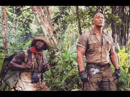 The popular fantasy adventure franchise began with the 1995 film starring the late robin williams as a man who is unwittingly brought back from being trapped inside a supernatural board game since he was a boy. Nick Jonas The Rock Kevin Hart Behind The Scenes Of New Movie Jumanji Youtube