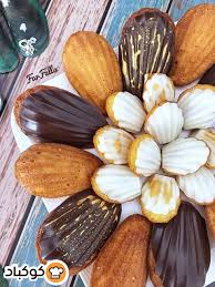 مادلين بالبندق والشوكولاتة Madeleine بالصور من Farfalla Recipe Vegetables Food Garlic