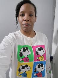 I SWEAR Nicole watterson (from amazing world of Gumball) was wearing this  as a badge before the rainbow one. Expect it was yellow and I dont think it  had a smile. After