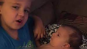 Little Boy Holds Baby Sister - He Starts Singing Her A Song And His Mother  Is Moved To Tears