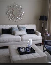 The raised tray edge around the top helps to keep your stuff from rolling off. Mirrored Ottoman Tray Ideas On Foter