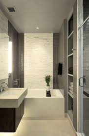 A big window in the bathroom is actually needed to keep your bathroom fresh and has a good air circulation. Modern Small Bathroom Design With Drop In Tub And Wall Mounted Sink Modern Small B Bathroom Design Small Modern Modern Small Bathrooms Small Bathroom Remodel