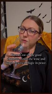 Finally, a moment of peace after all the Halloween chaos. 🍷🍫🧙✌️,  #witchvibes #practicalmagic #halloweennight #chocolateandwine  #momlifebelike #momsnightin #trickortreat