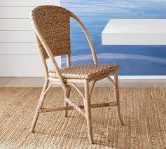 Check out our rattan dining chairs selection for the very best in unique or custom, handmade pieces from our dining chairs shops. Parisian Woven Dining Chair Pottery Barn