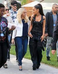 A cropped sweatshirt + cuffed jeans. Ariana Grande Outfits That Are Truly Iconic Glamour
