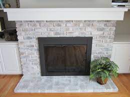 Update Fireplace Doors With Spray Paint Paint Fireplace Fireplace Doors Brick Fireplace